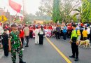 Jalan Sehat HUT RI ke-81, Bhabinkamtibmas Kawal 500 Warga Banjar Lebah